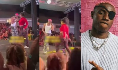 Moment curvy lady stopped Ruger from grabbing her while dancing with him on stage (Video) - curcy lady ruger stage 1