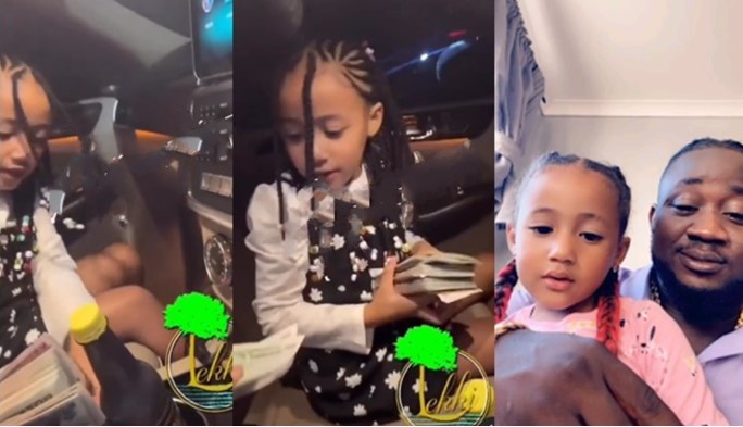 Daddy you're rich - Kogbagidi's daughter expresses surprise after seeing his stack of dollars (Video) - kogbagidi daughter daddy rich 1