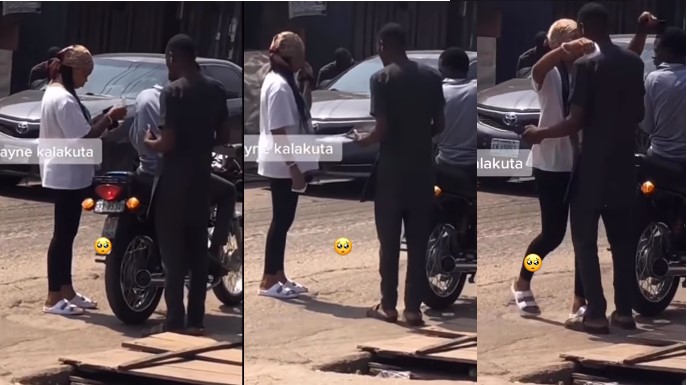 Moment young lady locked lips with a stranger for N10k (Video) - lady kiss stranger 10k 1