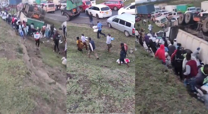 Travelers loot bags of foodstuff from lorry involved in accident (Video) - loot food lorry accident kenya 1