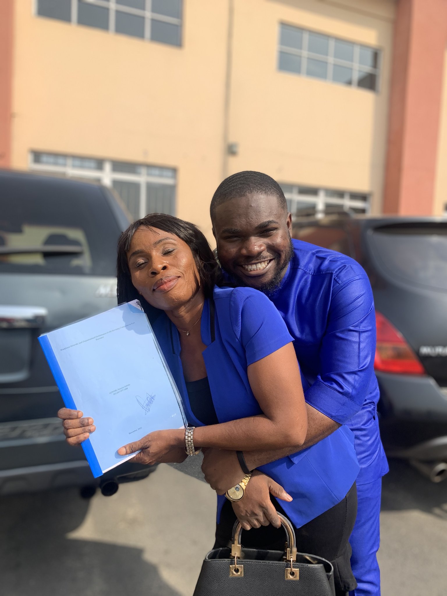 Man celebrates his mom becoming a graduate 20 years after dropping out to cater for him - man mother graduation 20 years