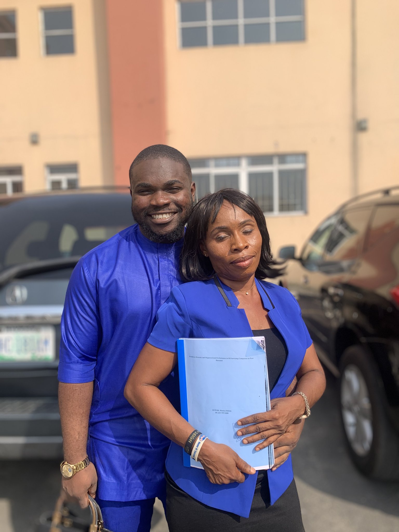 Man celebrates his mom becoming a graduate 20 years after dropping out to cater for him - man mother graduation 20 years3