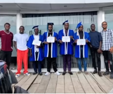 Nigerian youths flaunt certificate as they graduate from mechanic training school in style - mechanics graduate2