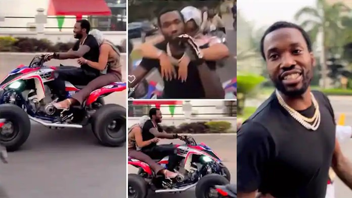 Reactions as lady hides her face while riding bike with Meek Mill in Ghana (Video) - meek mill bike lady ghana 1