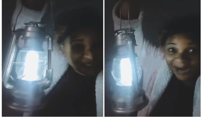 We also suffer power outage in Canada - Woman tells Nigerians as she uses lantern (Video) - nigerian lady power lantern canada 1