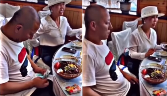 Woman captured on tape stylishly giving her man cash to pay bill at restaurant (Watch video) - woman give husband cash bill restaurant 1