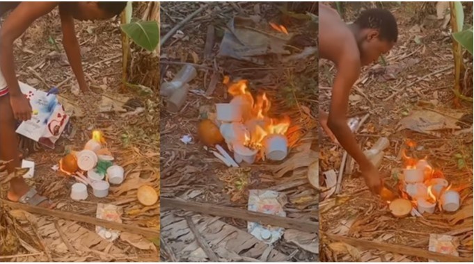 Repentant yahoo boy sets his 'scamming charms' on fire (Watch video) - yahoo boy repent burn charms 1
