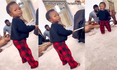 Funny video: Little boy gives his aunt distasteful look for not bringing gift while coming to spend holiday with them - boy funny look aunt christmas gift 1