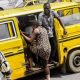 Man lands in police station after attacking danfo passenger who toasted his wife in his presence - man wife woo danfo bus 1