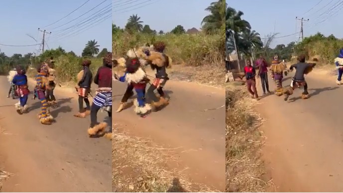 Masquerades on opposing sides engage in messy fight on the road (Video) - masquerades fight 1