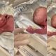 Funny reactions as newborn baby holds doctor's hand and refuses to let go (Video) - newborn baby hold doctor gloves 1