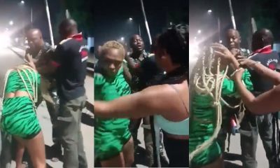 Policemen brutalise woman for recording them assaulting commercial driver (Video) - police assault woman record lagos 1