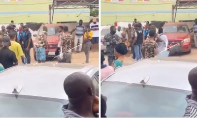 Drama as man kicks soldiers gallon at filling station (Video) - soldier filling station