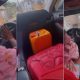 Lady seeks justice as boyfriend puts gallon of fuel in front seat and demotes her to the back (Video) - lady boyfriend car petrol
