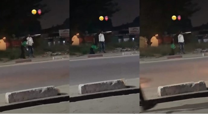 Lady seen kneeling to beg her man by the roadside (Watch video)
