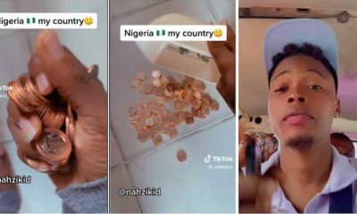 Man shows N5k worth of coins bank allegedly gave him after withdrawing (Video) - man 2n coins 5k