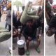 Frustrated man storms bank with bed, gas cooker, vows not to leave till he gets cash (Video) - man bank cooker bed