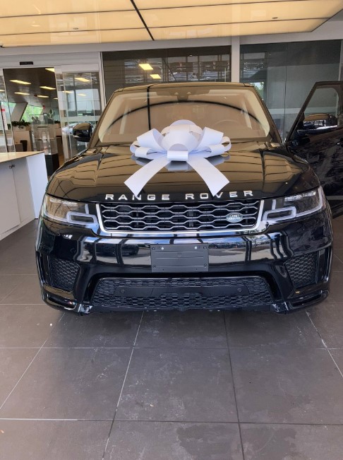 Nigerian singer buys Range Rover as Valentine gift for his woman - singer lexxy range rover woman4