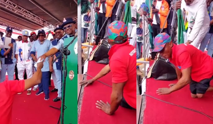 Reactions as Wike gives physically disabled man bundle of new naira notes