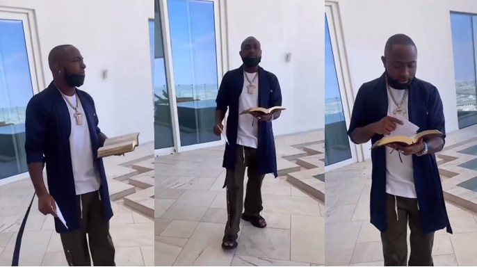 Davido seen studying the bible at home