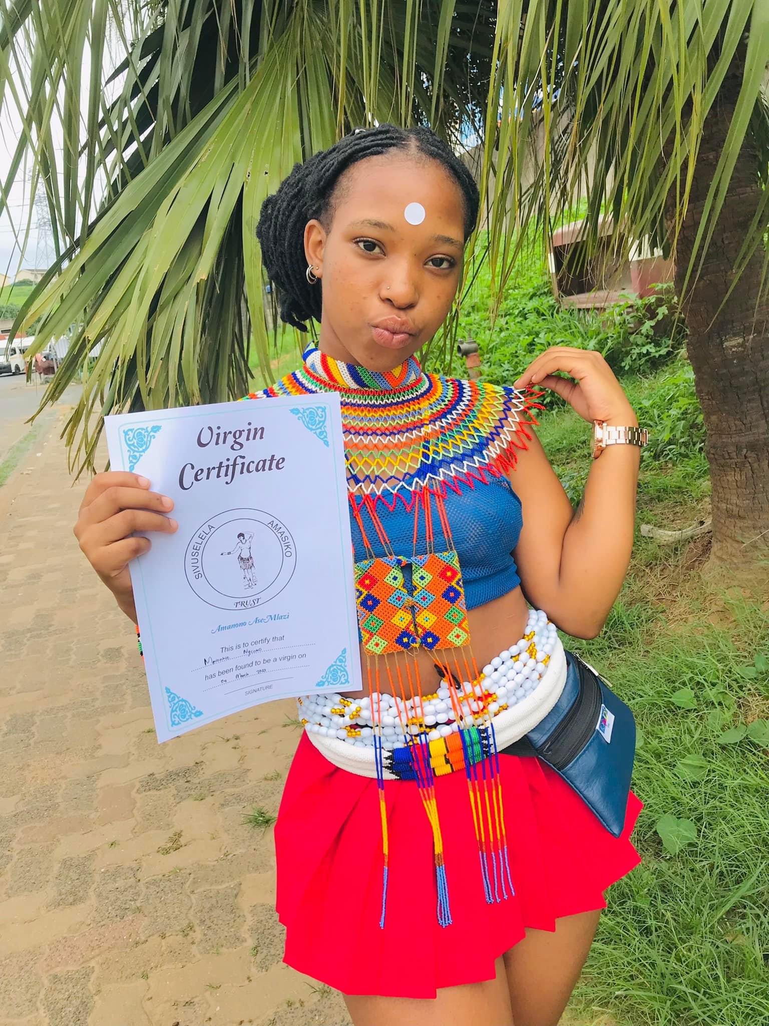 Beautiful lady proudly flaunts her certificate of virginity - lady virginity2