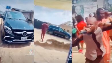 Church members troop out to touch pastor’s Benz to receive blessings