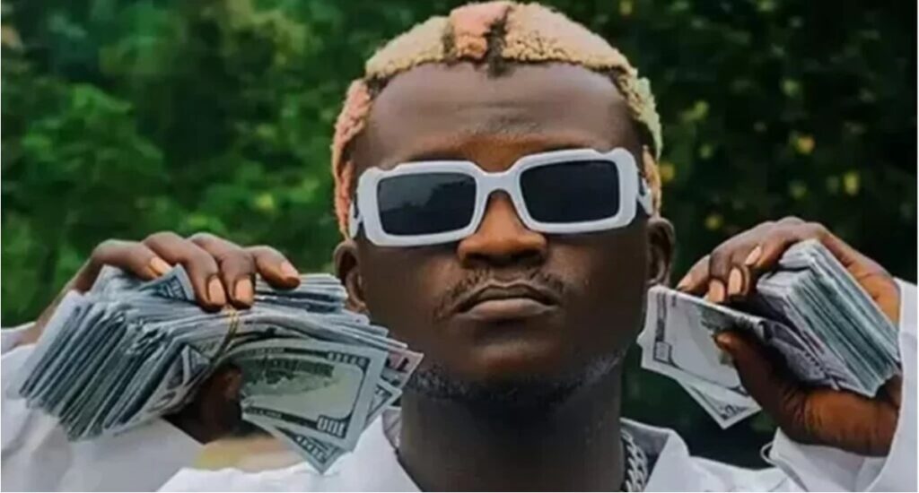 Portable begs EFCC to overlook videos of him spraying money to fans